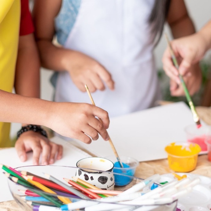 Children painting in an art lesson