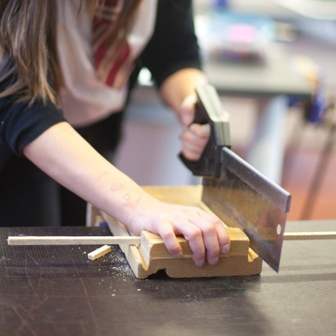 Children learning resistant materials in school